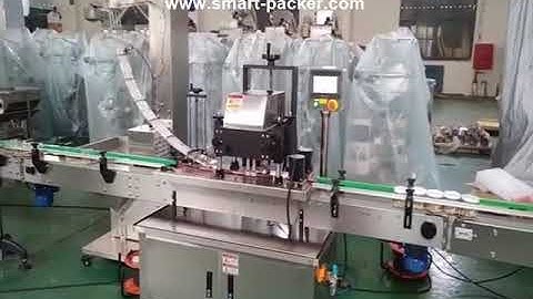 Automatic bottle cap positioning screw capping machine testing video