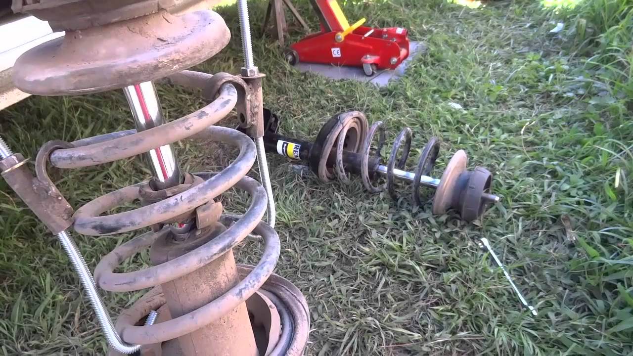 como cambiar amortiguadores y cazoletas de renault kangoo ...