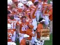 Texas Player shoves coach in celebration! Texas player pushes down coach in Texas huddle celebration