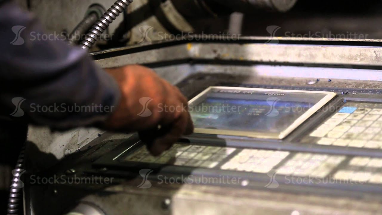 operator presses on the keyboard of the machine - YouTube