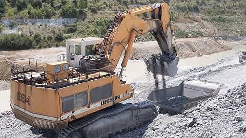 Liebherr 994 loading Perlini dumptruck and in-cab view