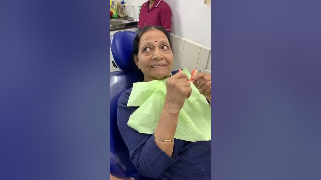 Implant supported lower denture . Very tight fitting of implant ..Teaching patient how to remove