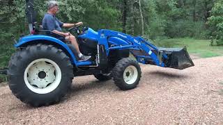 Lot #100-Round Top Moving Online Auction- New Holland 4WD 16LA Tractor Model #16LA