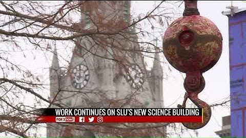 Topping ceremony held for new Saint Louis University STEM building