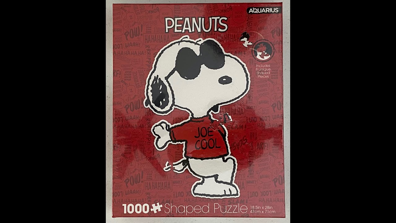 A 1000 piece Joe Cool shaped Peanuts puzzle. - YouTube
