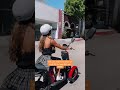 Riding a Moped around Beverly Hills