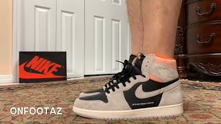 jordan 1 neutral grey hyper crimson on feet