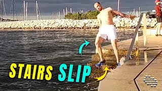 Guy Slip Down the Stairs Leading to Water