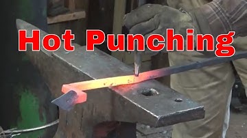 Punching holes in the rails for the window grill project