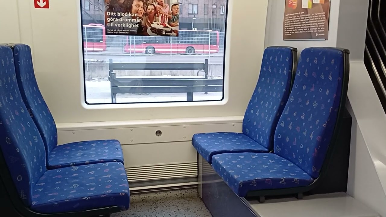 SL pendeltåg Stockholm city station to Barkarby station.