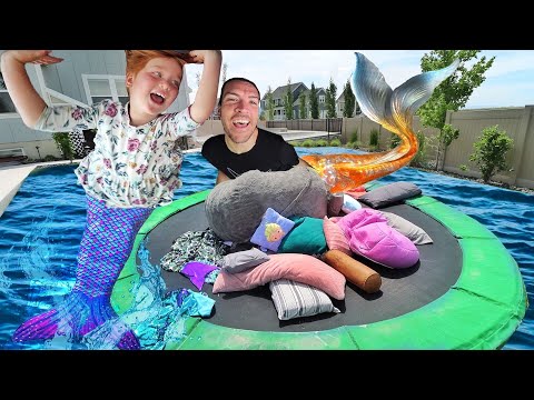 Mermaid PiLLOW FiGHT!!  Adley vs Dad magic trampoline battle with a Giant LoveSac in the Backyard!