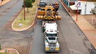 Giant Cargo: Oversize Load Passing Through Cue