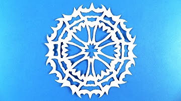 Paper snowflake tutorial - learn how to make snowflakes in 5 minutes.