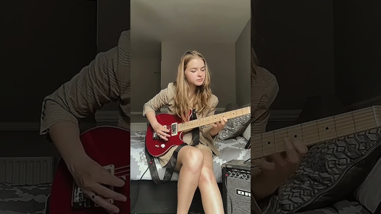 BEAUTIFUL GIRL PLAYING GUITAR 