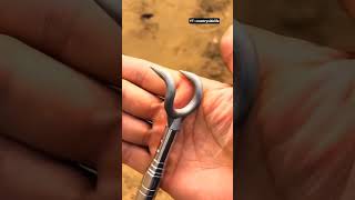🌱✂️ Long-Handled Mulch Cutter Demonstrating Quick Seedling Exposure