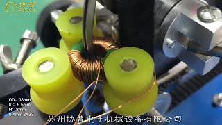 Toroidal coil wrapping machine, this is a common mode inductor,