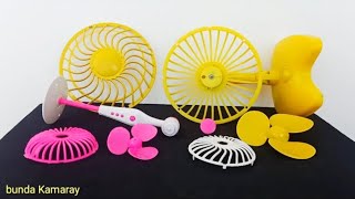 Memasang jala pelindung kipas angin mini warna pink dan kuning - Fan toy