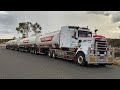 Truck driver reverse 2 trailers  a dolly for a baa quad road train