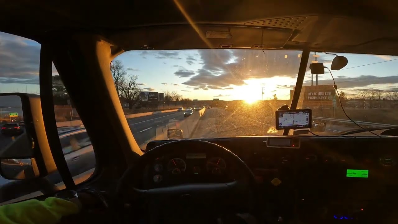 POV Truck Driving into the sunset