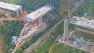 Mega Highway Swing Bridge to Dock with Main Section in southwest China A mega highway swing bridge is scheduled to complete its docking with the main section of the Chongqing-Kunming Highway on