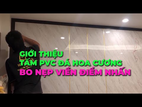 Tấm ốp vách tivi bằng tấm pvc vân giả đá có bo viền xung quanh cực nổi bật