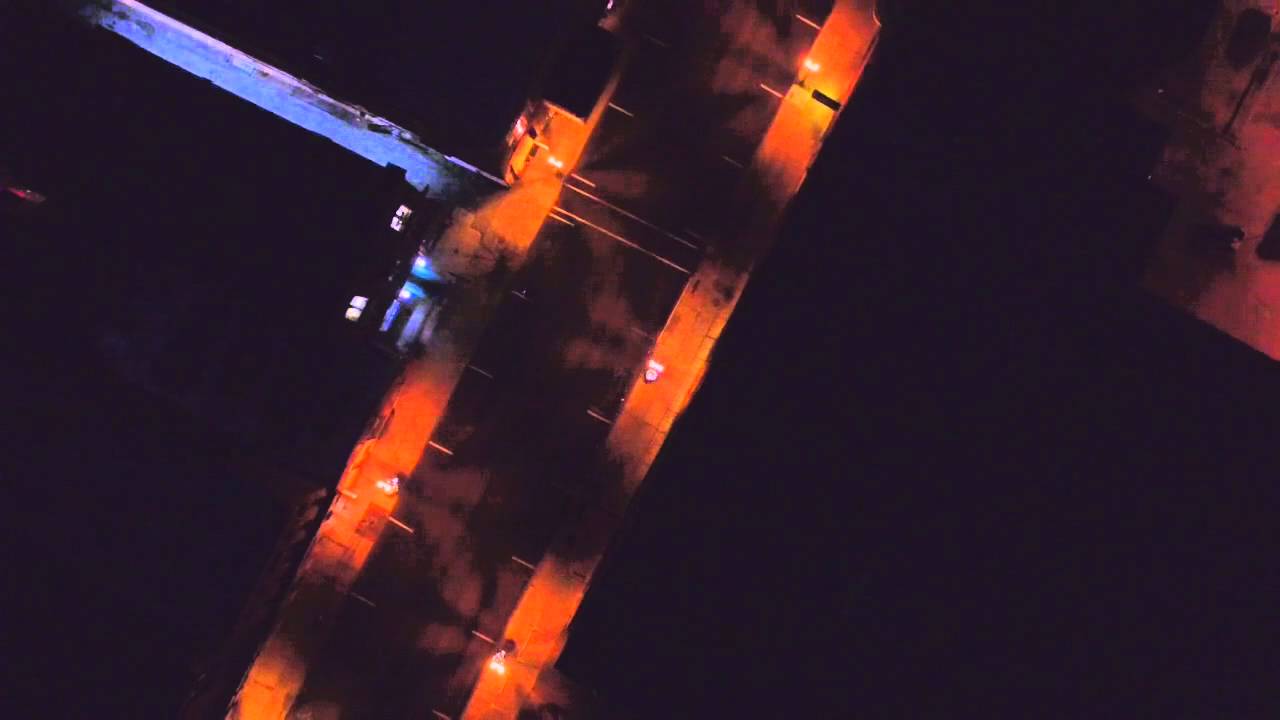 Drone flight at knight over tower 400 feet up.