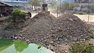 Launch a new project !! Filling pit by bulldozers KOMAT'SU D20P pushes into water.