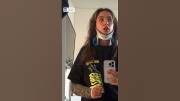 Broken arm in a cast and neck brace
