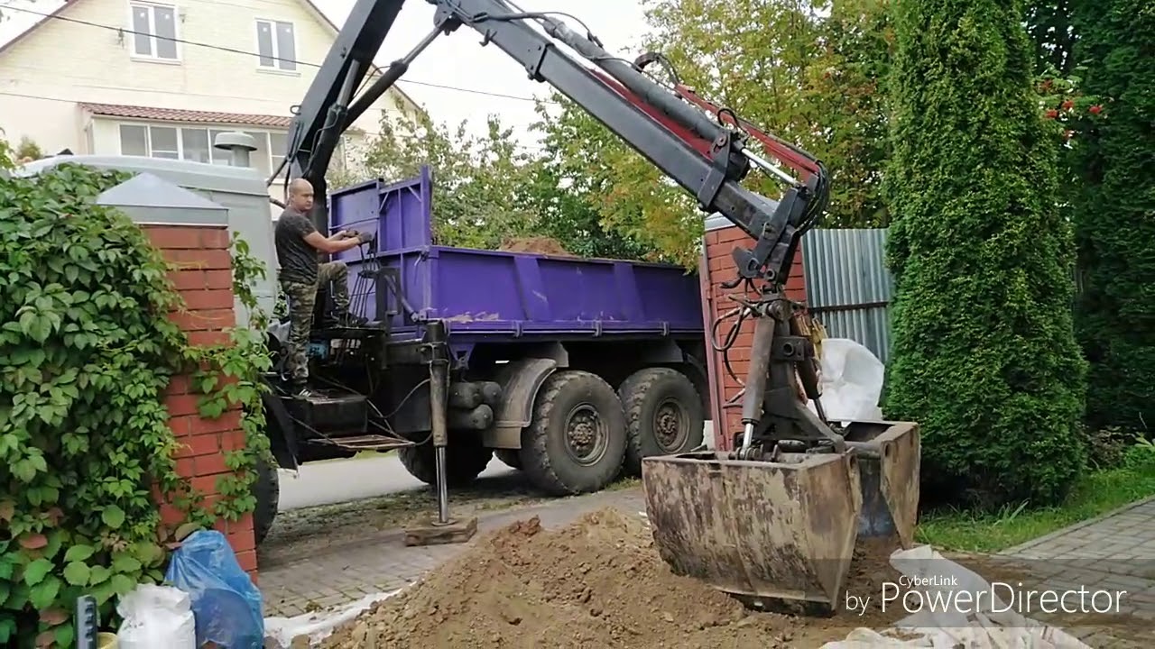 Камаз с грейферным захватом