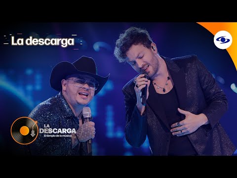 Franko y Gusi cantan &#39;Mariposa traicionera&#39; - La Descarga