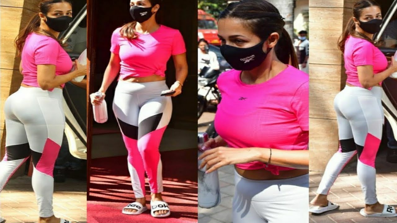Malaika Arora amped up her gym look with a knotted hot pink tee