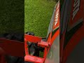 Kubota bx1410 mowing with belly deck