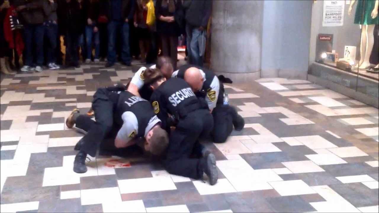 4 security guard on 1 guy takedown ottawa rideau youtube target loss prevention