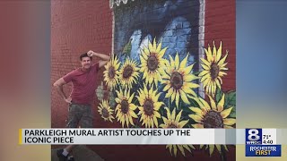 Parkleigh mural artist touches up the iconic piece