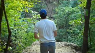 Throwing disc off the cliff down under at Rosedale