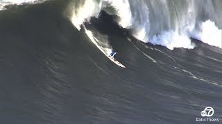 Surfers catch big waves at Mavericks in Half Moon Bay