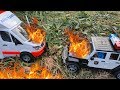 Police car rescue  ambulance  fire trucks help cars that are on fire