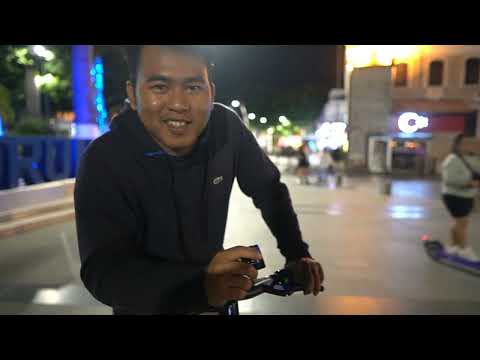 Naik scooter listrik,