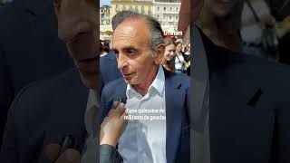 Eric Zemmour frappe une femme qui vient de lui jeter un œuf sur un marché en Corse screenshot 3