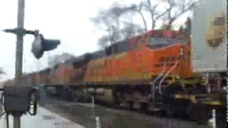 BNSF 8371 leads EB stack with sandwiched Dash 9s