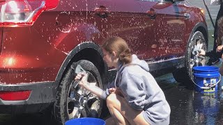 Students Hold Car Wash Fundraiser For Women’s Shelter screenshot 5