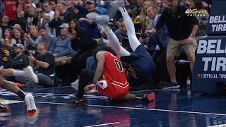 Scary fall for Coby White... Pascal Siakam lands on him after the crazy block late in the 4th