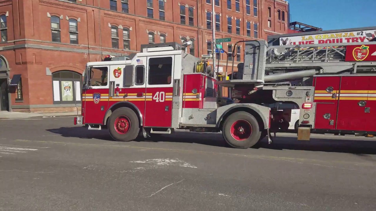 FDNY Engine 37 And Tiller Ladder 40 Responding On Broadway In Manhattan