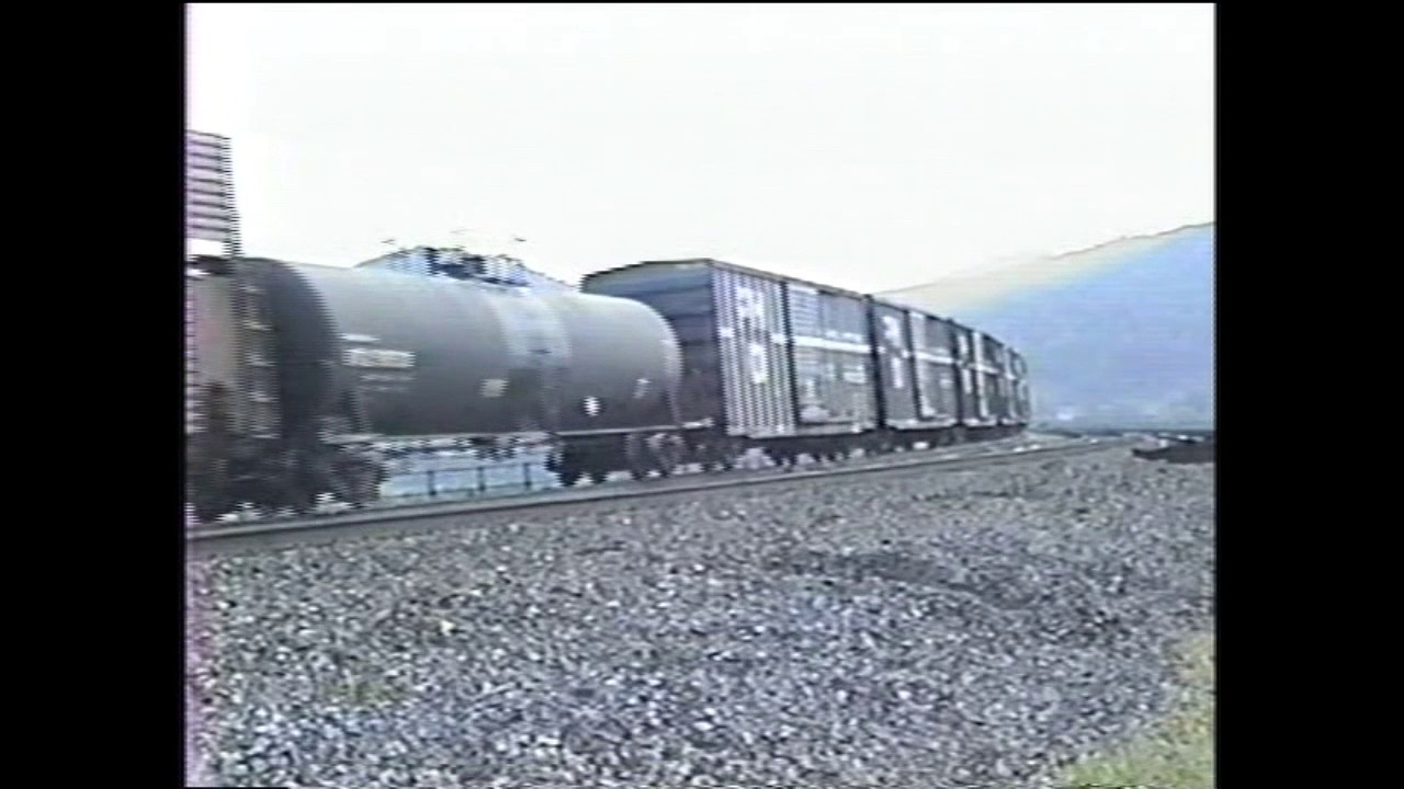 CONRAIL westbound long Freight train with caboose in Enola Rockville Bridge in Summer 1988