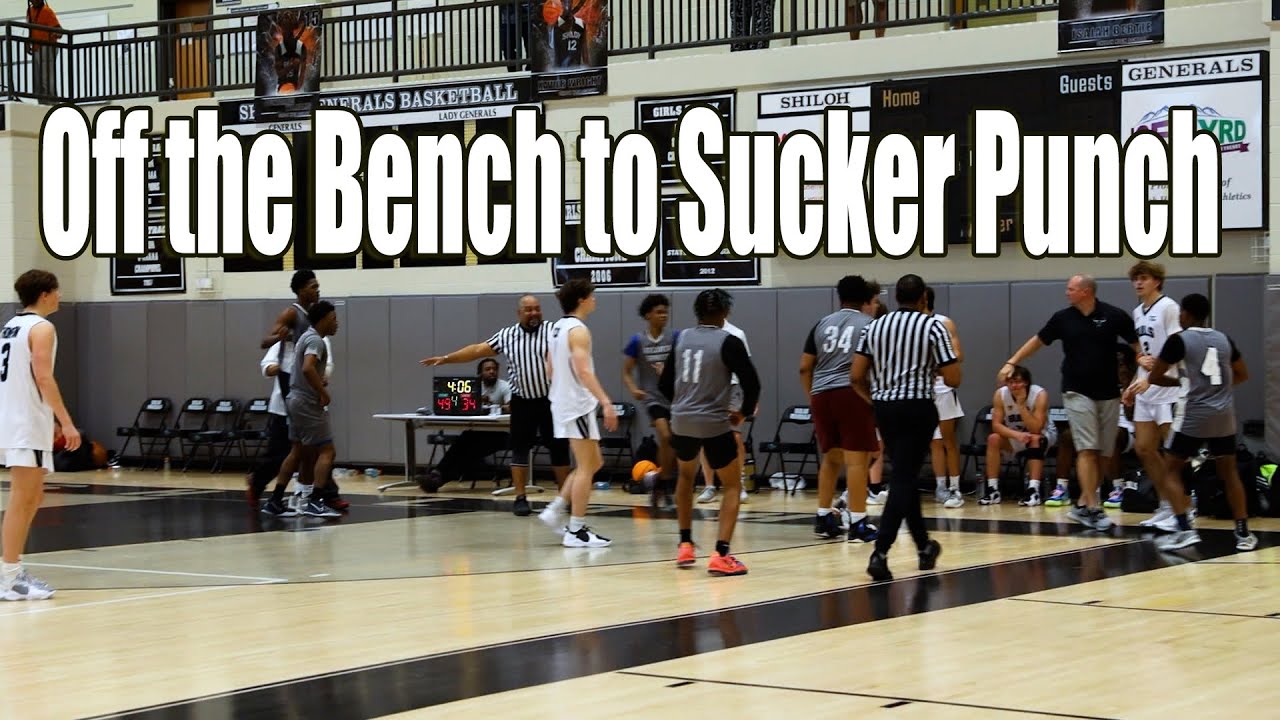 Player comes off bench to sucker punch an opponent during a basketball