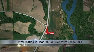 Driver injured in head-on collision with school bus