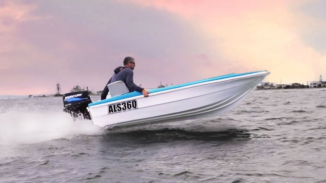 a 300 kg motorboat is turned off as it approaches