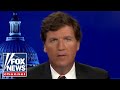 Tucker: We are at war with Russia