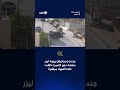 جندي إسرائيلي يوجه ليزر سلاحه إلى كاميرا «الغد» بعد العملية التي قتل فيها جنديان إسرائيليان بالخليل