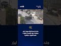 جندي إسرائيلي يوجه ليزر سلاحه إلى كاميرا «الغد» بعد العملية التي قتل فيها جنديان إسرائيليان بالخليل